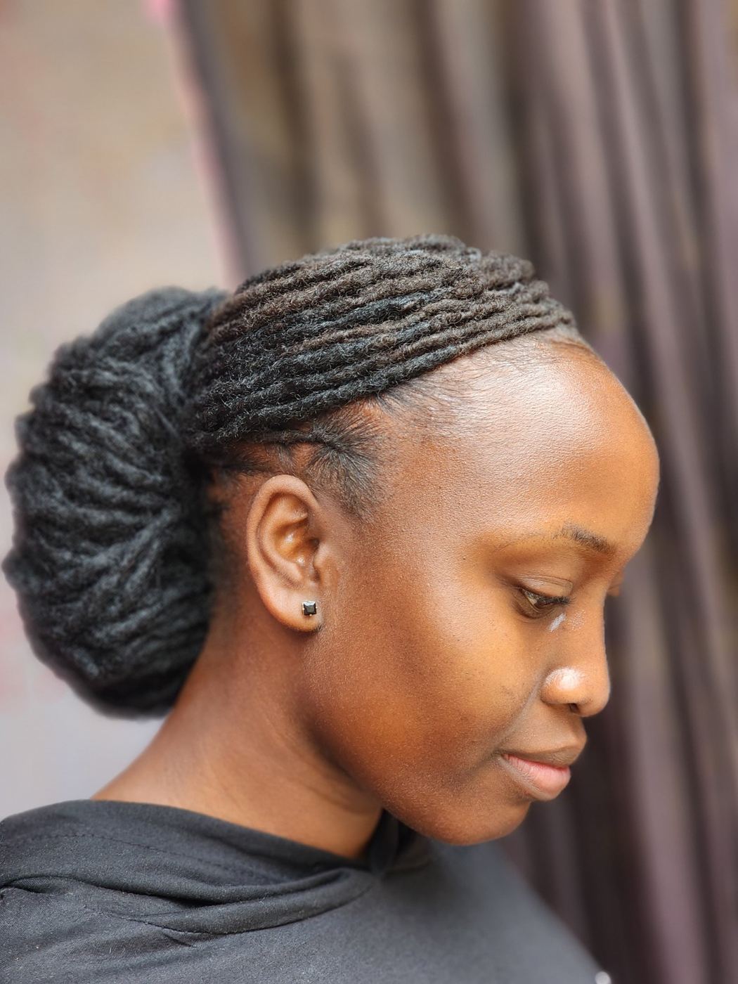 Sleek low loc bun